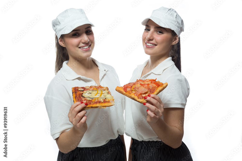 Beautiful twin sisters with pizza on white background