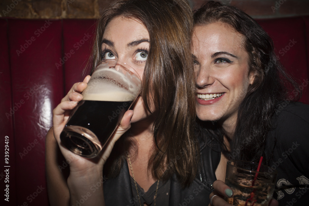 Friends drinking at a nightclub Friends drinking at a nightclub