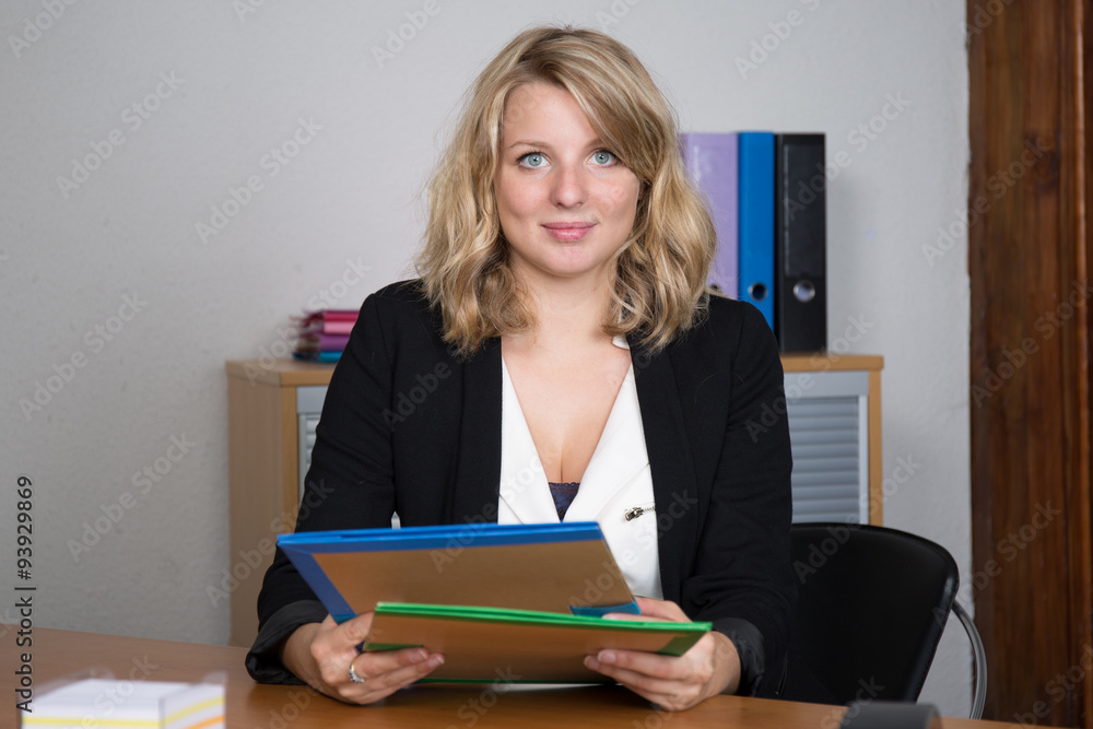 Woman looking at the camera in business place Woman looking at the camera in business place