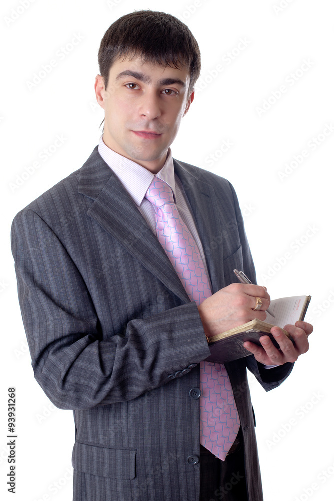 The man with a ball pen and to notebooks in hands The man with a ball pen and to notebooks in hands
