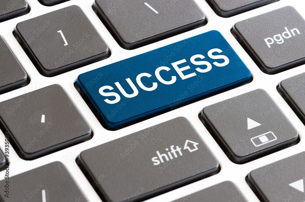 close up success button on keyboard computer close up success button on keyboard computer