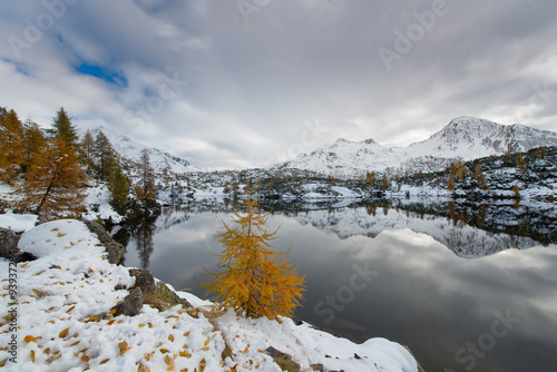 Contrast autumn winter alpine lake