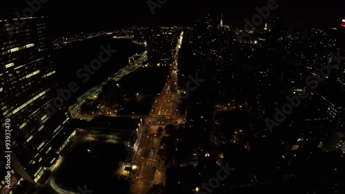 Night timelapse of the Midtown Manhattan, First Avenue, FDR Drive and East River in New York City, USA. photo