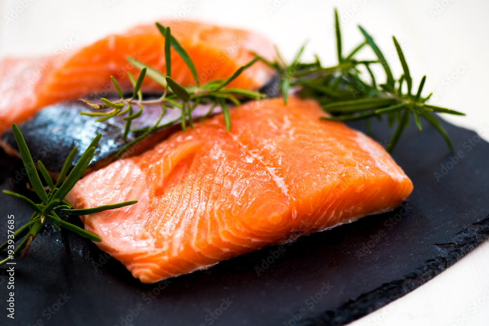 Portions of Fresh Salmon Fillets with Aromatic Herbs and Spices