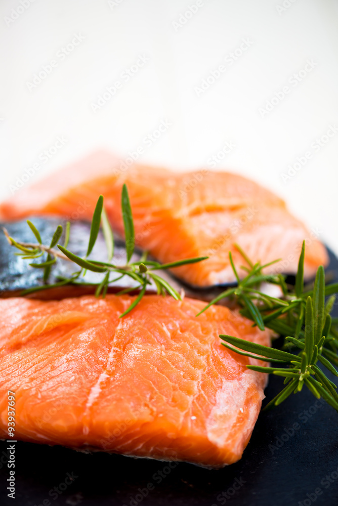 Portions of Fresh Salmon Fillets with Aromatic Herbs and Spices Portions of Fresh Salmon Fillets with Aromatic Herbs and Spices