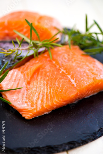 Portions of Fresh Salmon Fillets with Aromatic Herbs and Spices