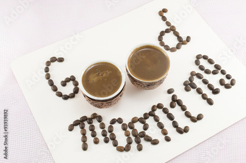 Картината върху платно Two cups of coffee forming note