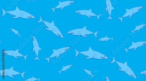 Vector seamless pattern of sharks. Sharks are located randomly on a blue background.