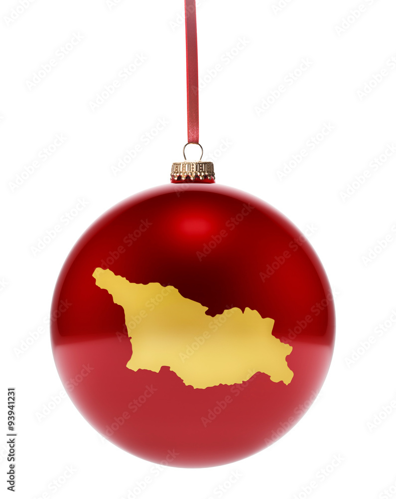 Red bauble with the golden shape of Georgia.(series) Red bauble with the golden shape of Georgia.(series)