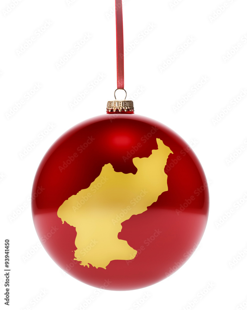 Red bauble with the golden shape of North Korea.(series) Red bauble with the golden shape of North Korea.(series)