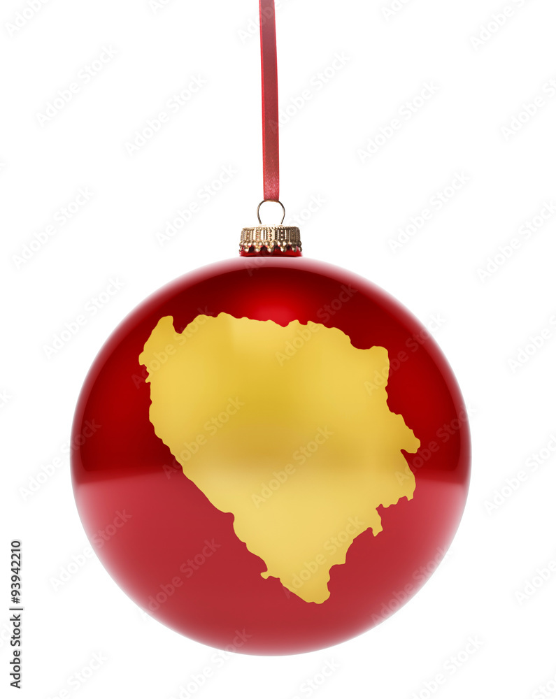 Red bauble with the golden shape of Bosnia and Herzegovina.(seri Red bauble with the golden shape of Bosnia and Herzegovina.(seri