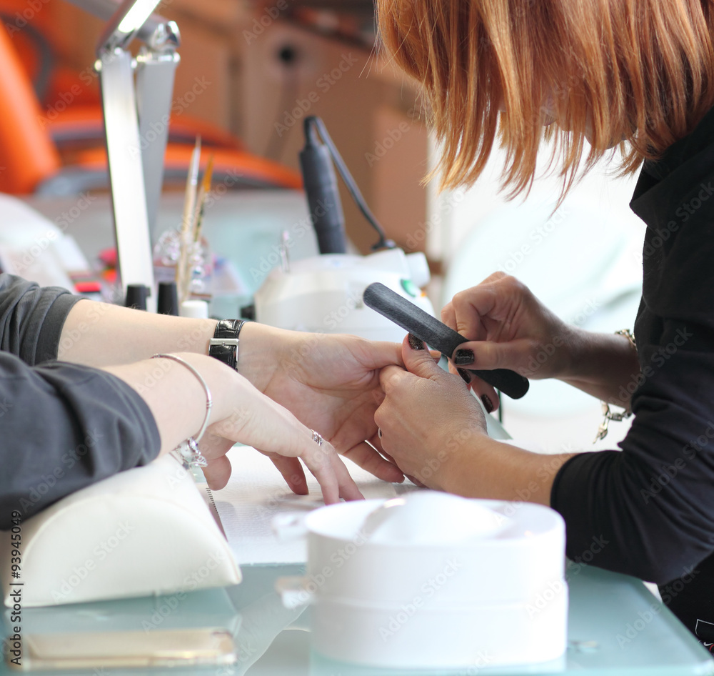 Fototapeta premium Manicure process... Female hands...