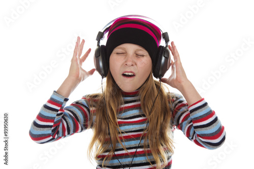 Girl with headphones listening to music.