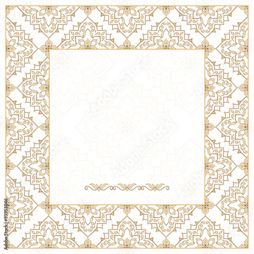 Filigree gold frame on white.