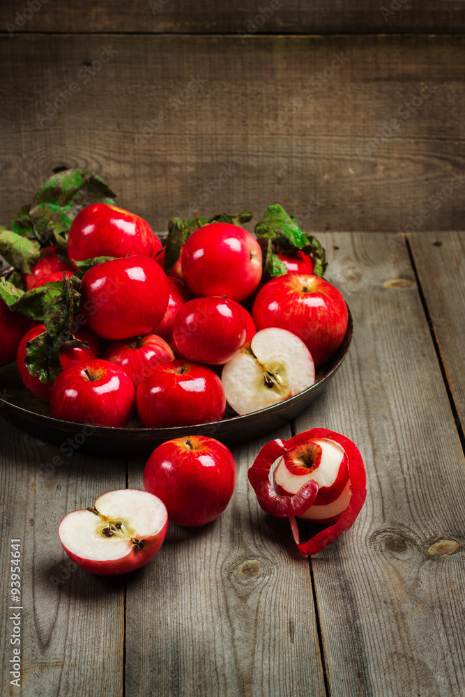 Fresh red organic apples on a rustic table Fresh red organic apples on a rustic table