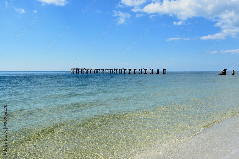 
An abandoned pier, with crystal clear water, Gasparilla Island beach, Boca Grande, Florida.
