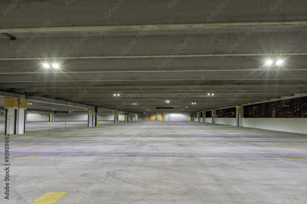 Empty parking garage at night
