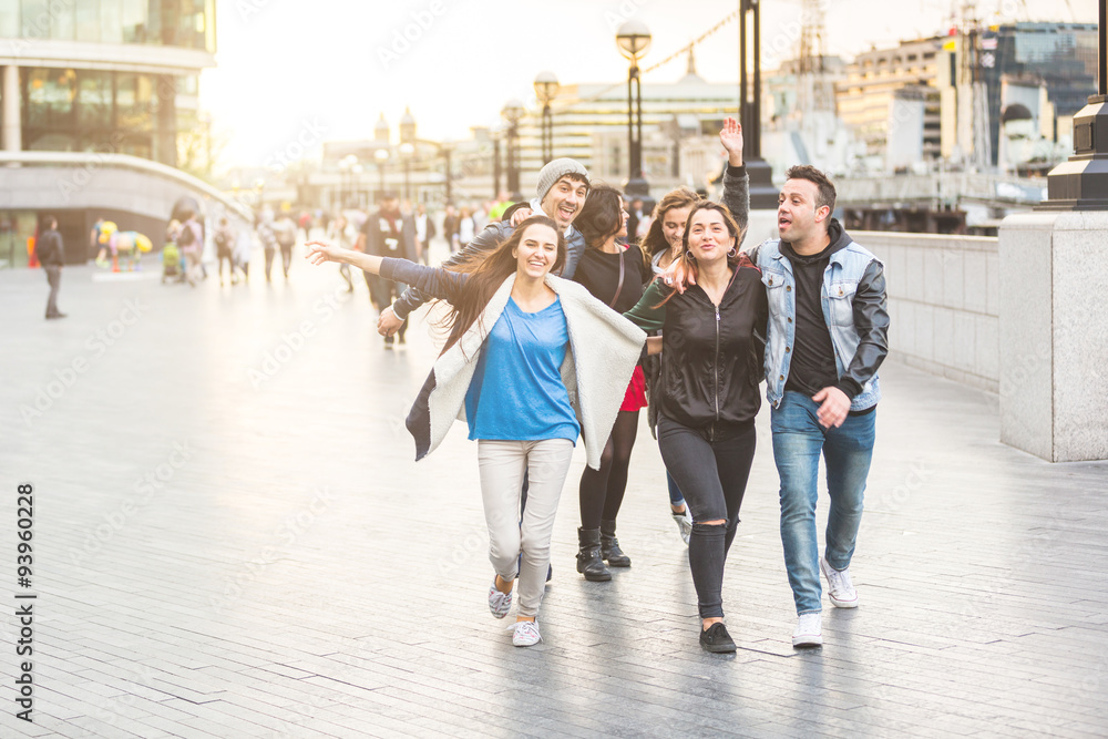 Obraz premium Group of friends enjoying having fun together in London