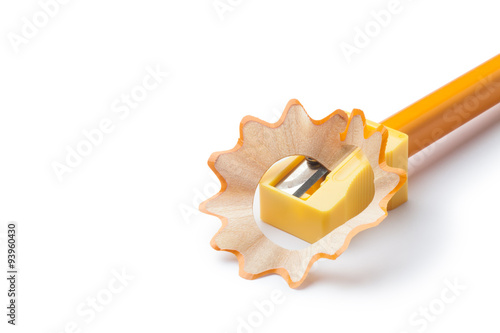 Pencil sharpener with yellow pencil on white background