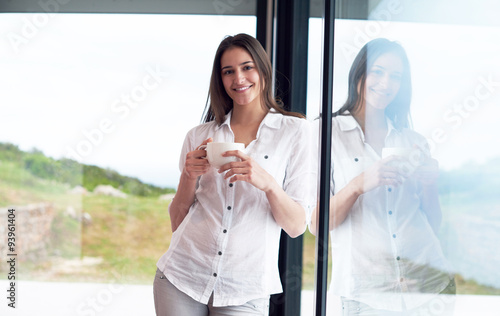 beautiful young woman drink first morning coffee