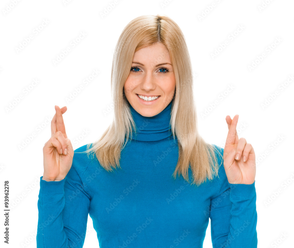young woman crossing fingers, praying, christening young woman crossing fingers, praying, christening