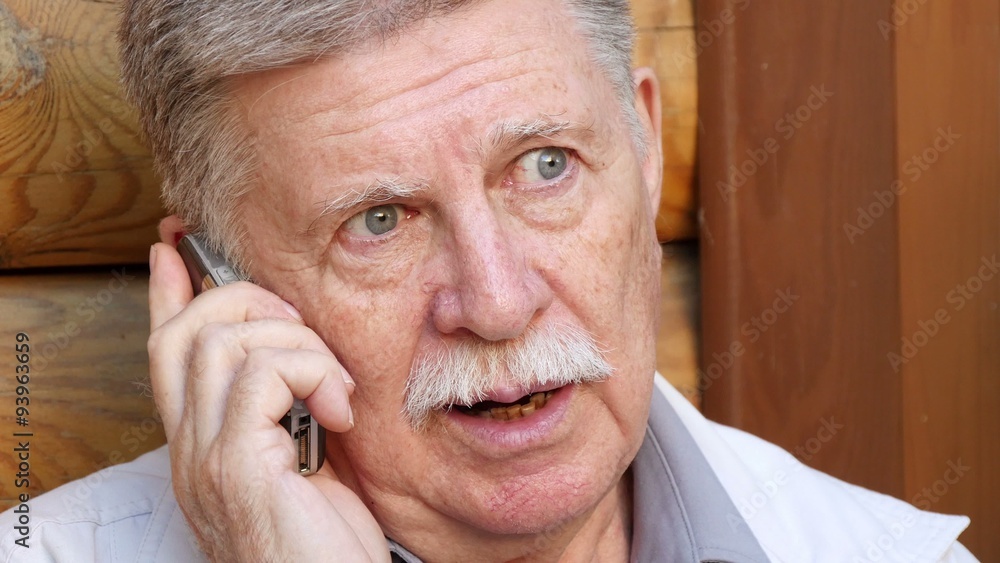Senior Man Speaking On The Phone Senior Man Speaking On The Phone