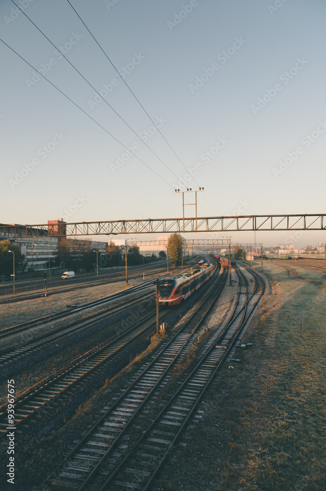 Motion of modern electric train at dawn