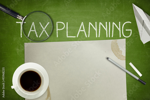 Tax planning concept on blackboard photo