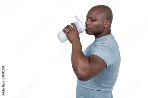 Fit man with protein shake