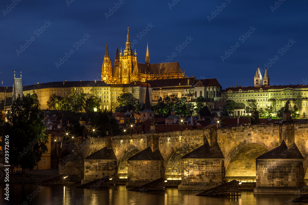  Castle and Charles Bridge by night in Prague, Czech Republic