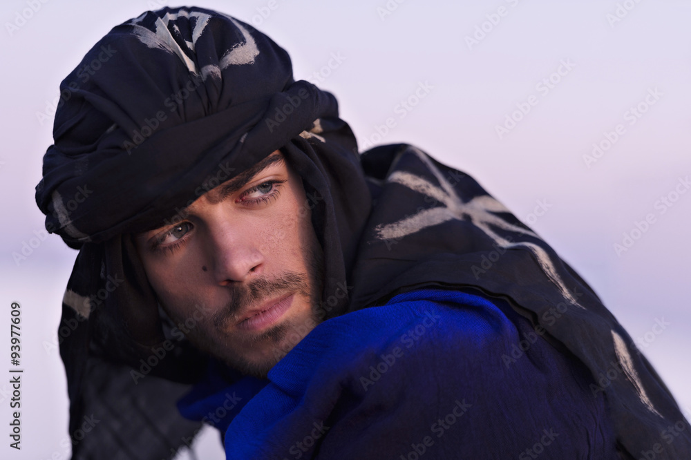 Man of berber ethnicity in traditional clothes in Moroccan Sahara Photos Adobe Stock