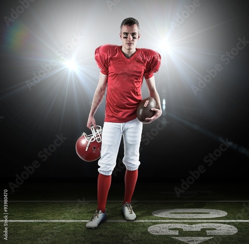 Composite image of a serious american football player © vectorfusionart