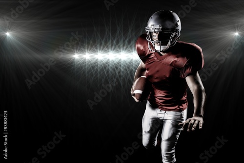 Composite image of sportsman playing american football © vectorfusionart