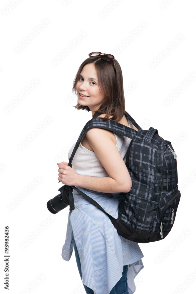Young woman tourist with camera and backpack Young woman tourist with camera and backpack