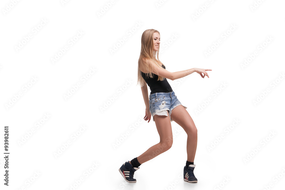 Young beautiful dancer posing on studio background Young beautiful dancer posing on studio background