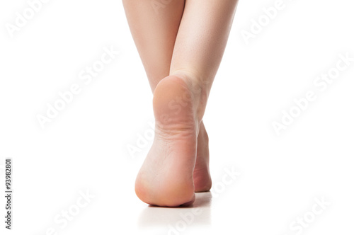 Back view of woman foot on white background, isolated, close-up
