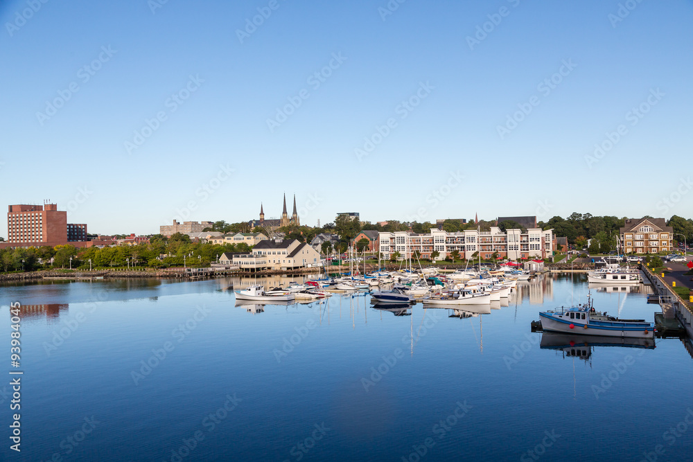 Fishing Boats and Reflections in Calm Blue Bay