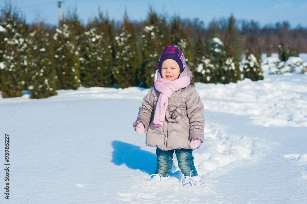 Little girl running in the snow in winter, lifestyle, winter holidays
Little girl running in the snow in winter, lifestyle, winter holidays