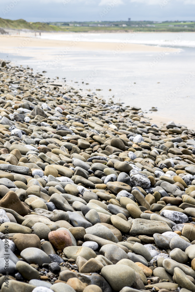 pebbled beach beside the links golf course