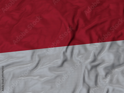 Closeup of ruffled Monaco flag,Ruffled flag background.
