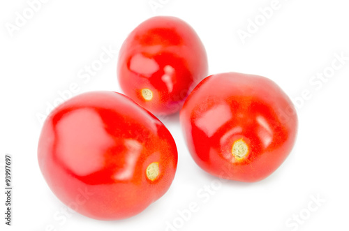 Juicy tomatoes on a white background
