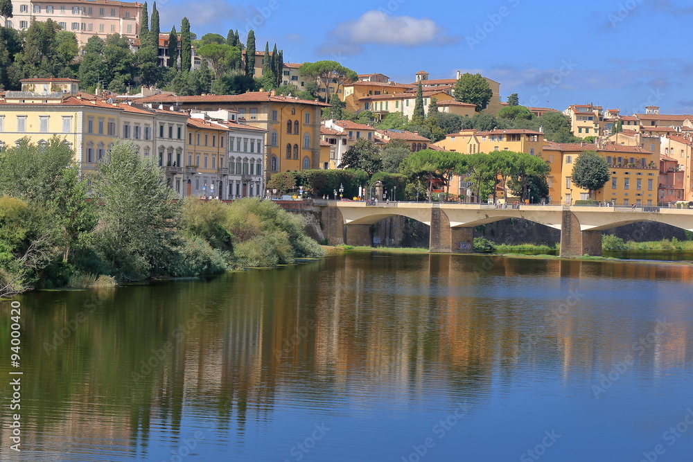 Arno River and bridge Ponte alle Grazie in Florence, Italy