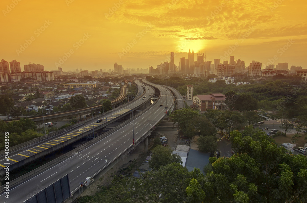  highway to Kuala Lumpur city during sunset