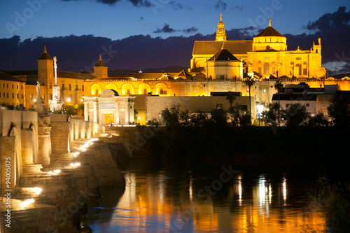  Famos Mosque (Mezquita) and Roman Bridge at night with