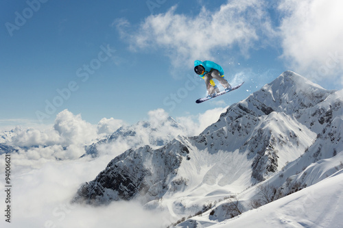 Flying skier on mountains, extreme sport © Vasily Merkushev