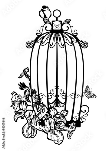 bird cage among flowers