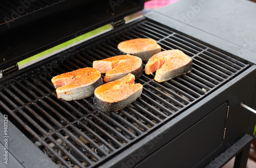 Salmon fish roasted on barbecue grill.