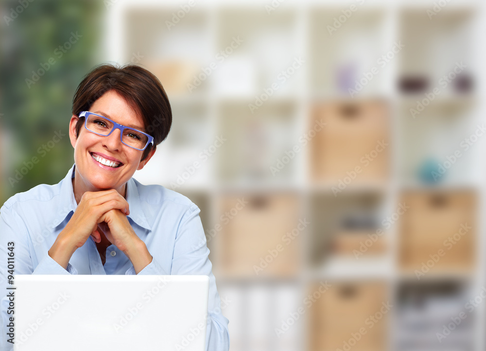 Mature business lady with laptop. Mature business lady with laptop.