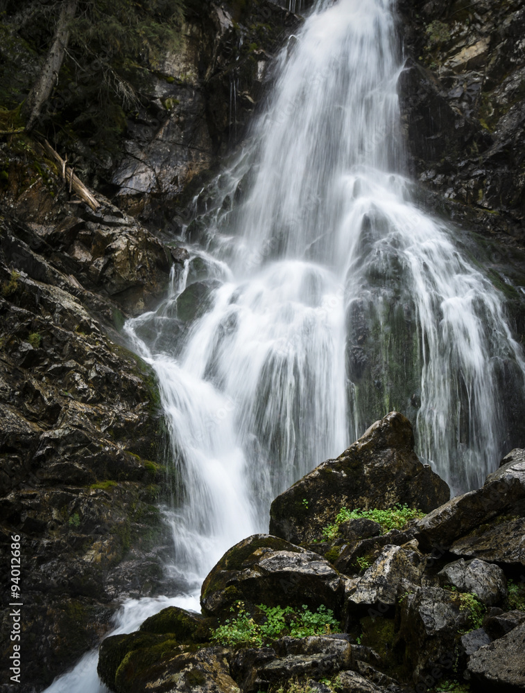 Wild mountain waterfall in the rocks