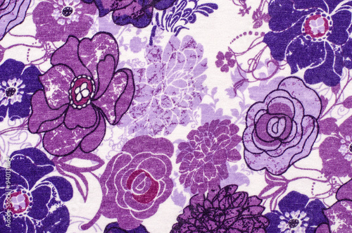 Purple floral pattern on white fabric. Mauve abstract flowers print as background.